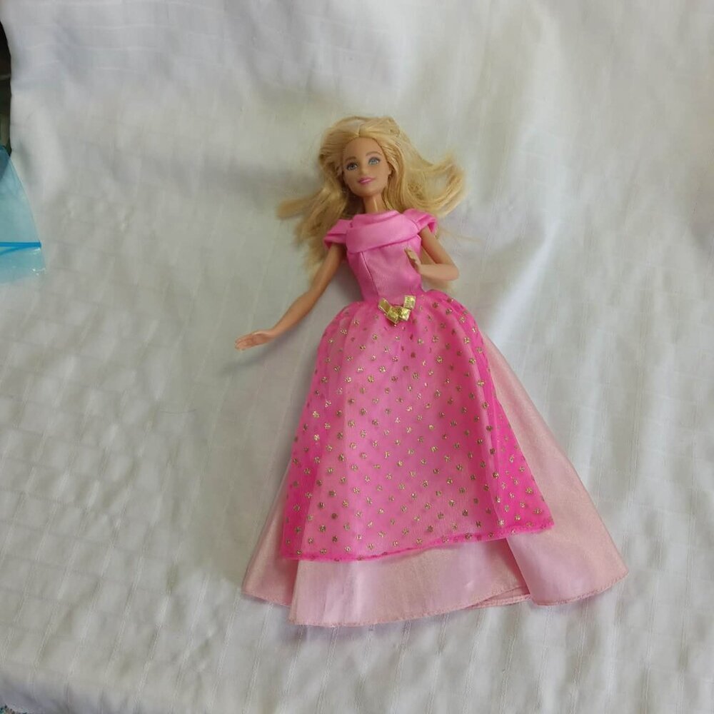 Set of original vintage Barbie & Ken outfits to mend